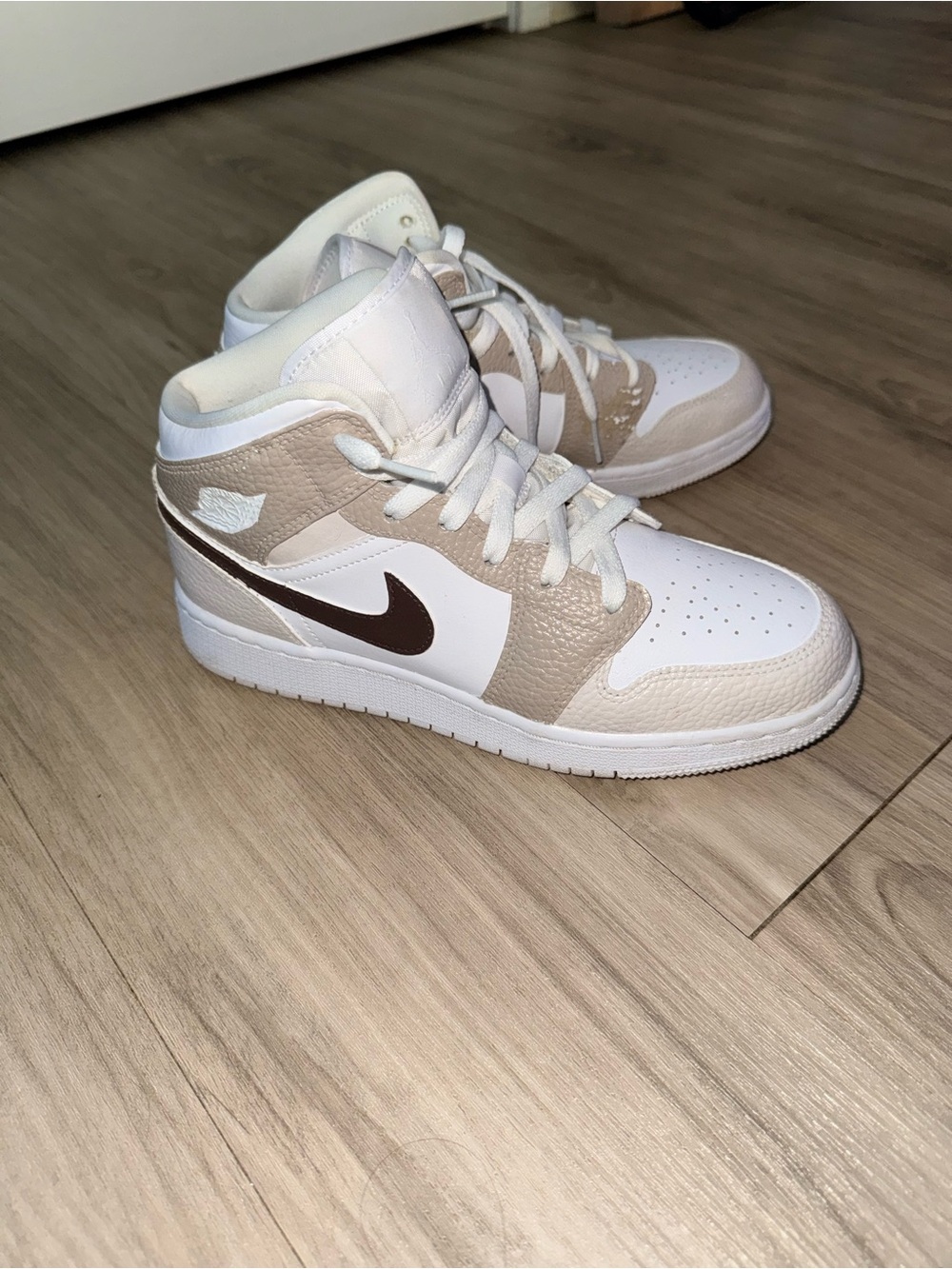 Nike Kids Mid-Top Sneakers in White and Beige with Brown Swoosh